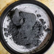 A bowl of powdered charcoal on the counter.